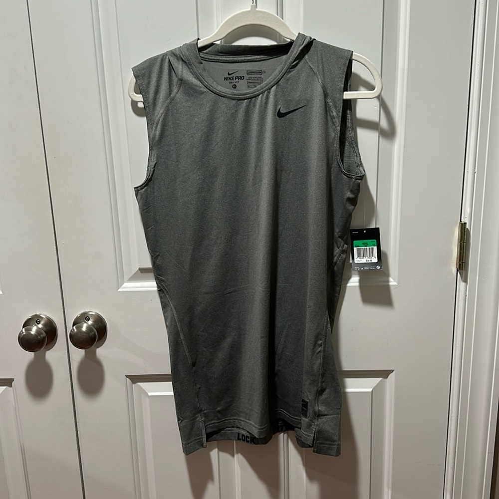 Nike pro dry fit extra large compression sleeveless shirts. Gray.